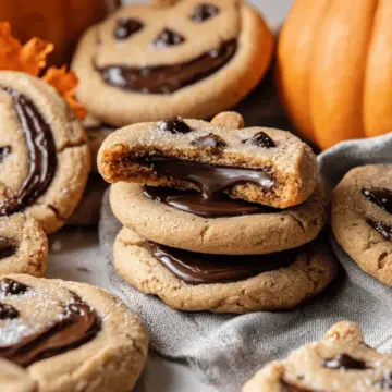 Milk Chocolate Stuffed Jack-O’-Lantern Cookies.